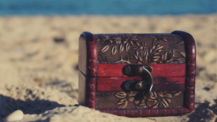 a tresure chest on sand
